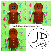 Load image into Gallery viewer, Collage of three gingerbread boy candy cane holders with the JD logo in the bottom right quarter
