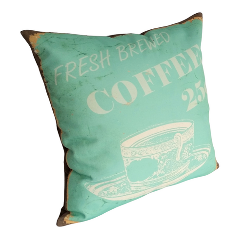 Coffee cushion with white lettering and a coffee cup on a pale blue background