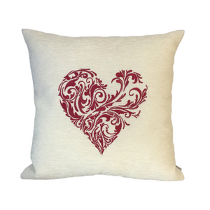 Embroidered heart cushion in pink thread on an ivory background fabric