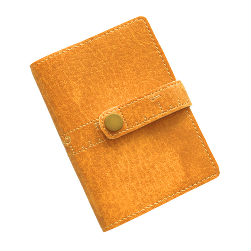 Ruler notebook in light brown faux leather with embroidered clasp closure